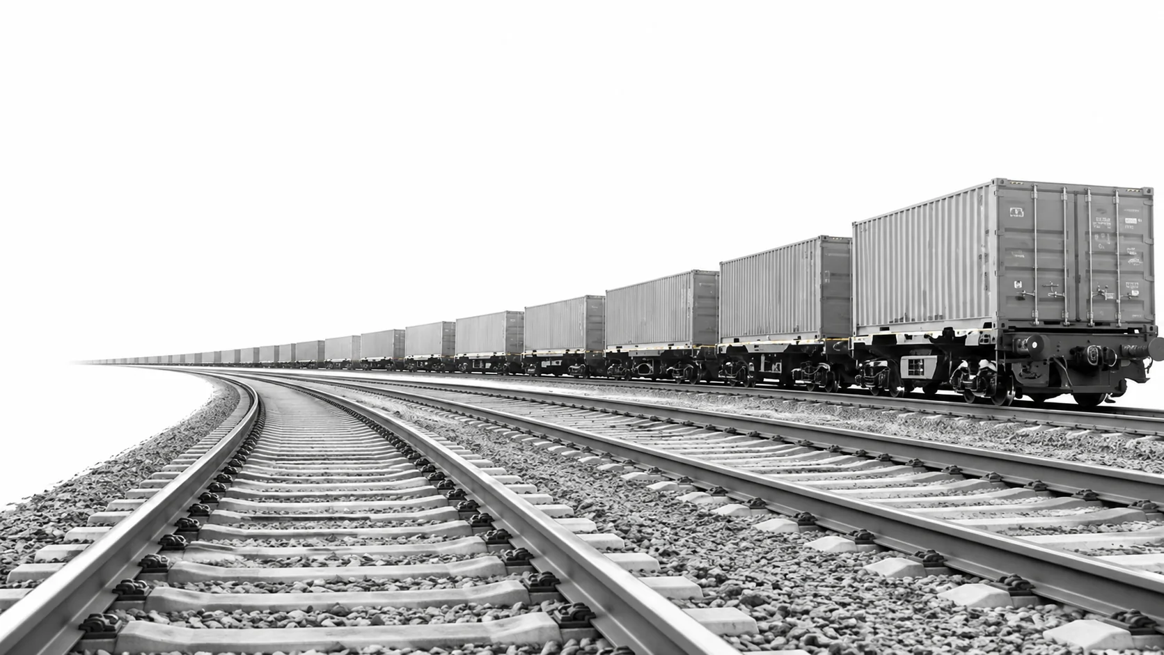 Monochrome freight train on railway tracks